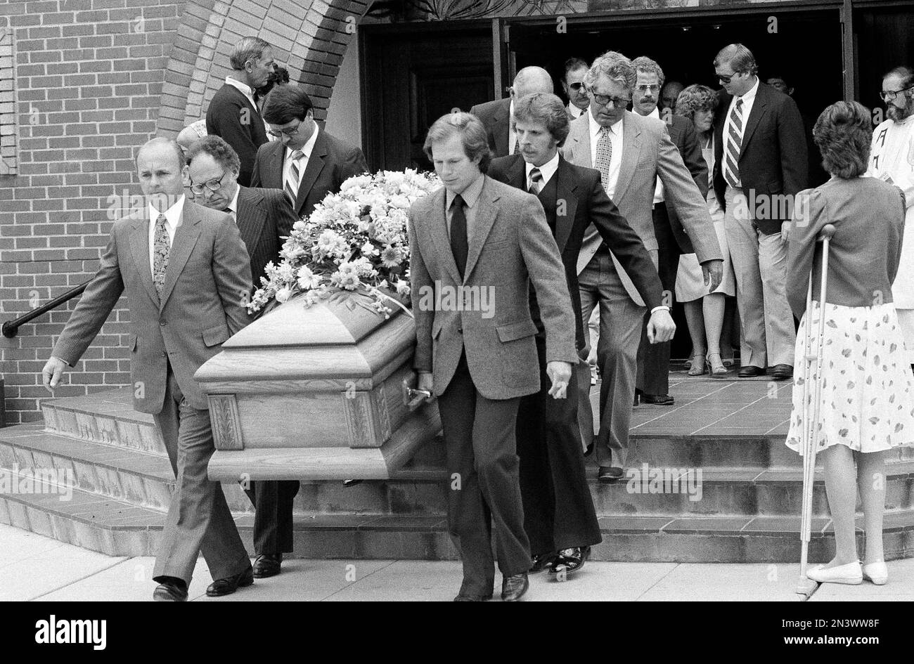Pallbearers carry the casket bearing the body of 10yearold