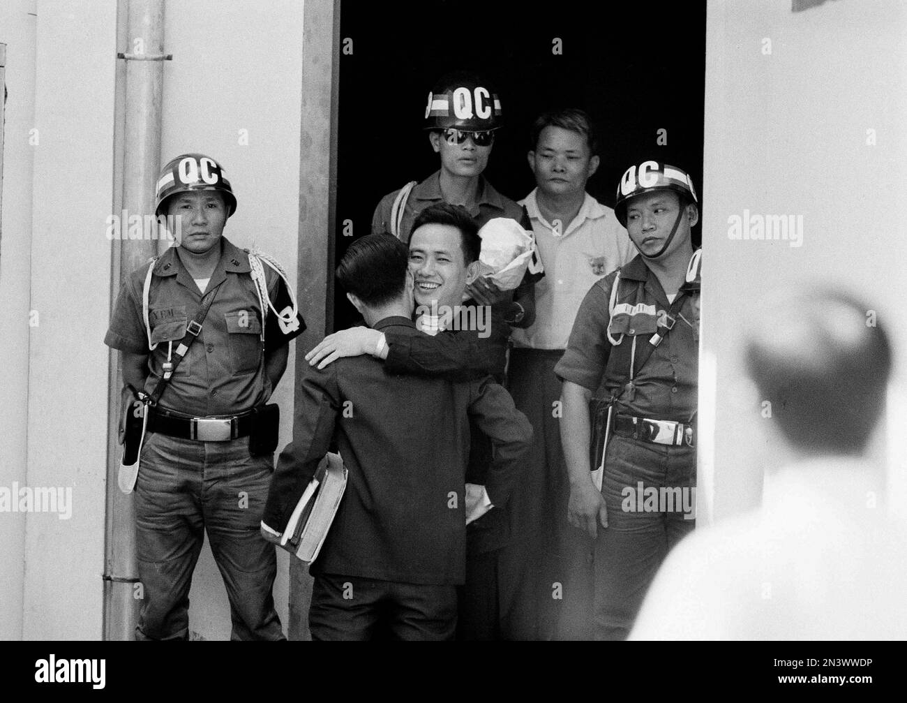 National Assemblyman Tran Ngoc Chau embraces his lawyer in Saigon after ...