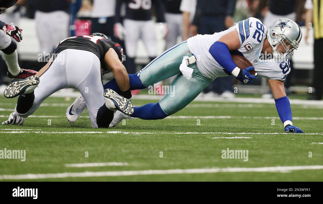 Houston Texans linebacker Mike Mohamed 54 tackles Dallas Cowboys tight end Jason Witten 82 during the second half of an NFL football game Sunday Oct. 5 2014 in Arlington Texas. Dallas won