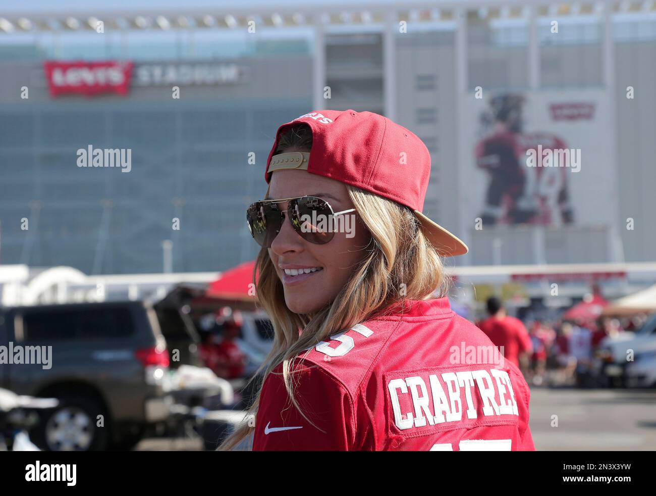 San Francisco 49ers fans Kelly Timko poses for photographs in the Levi ...