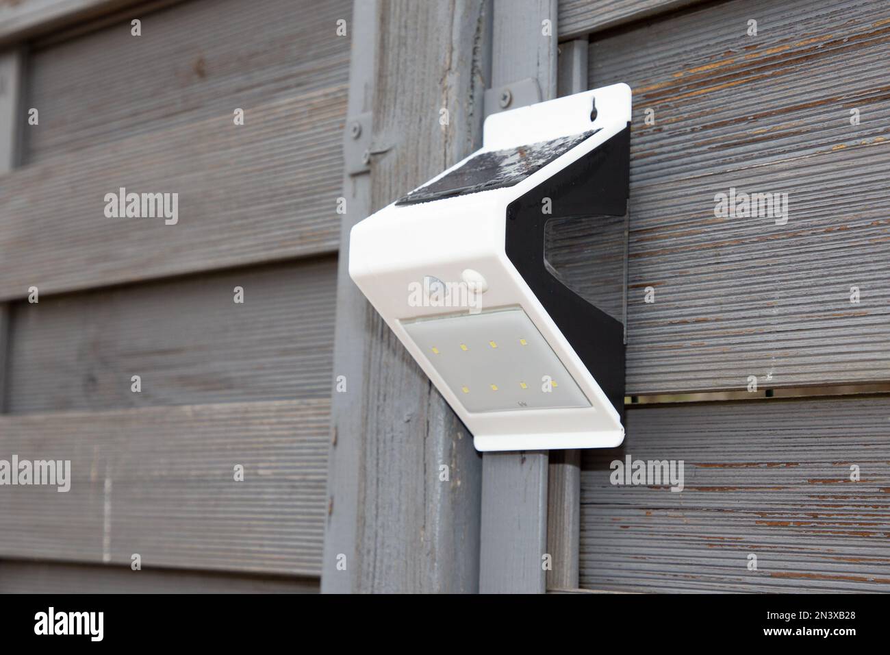 motion detector and outdoor garden light Stock Photo Alamy