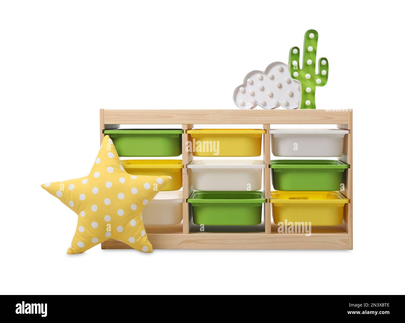 Wooden shelving unit with lamps and pillow on white background Stock ...