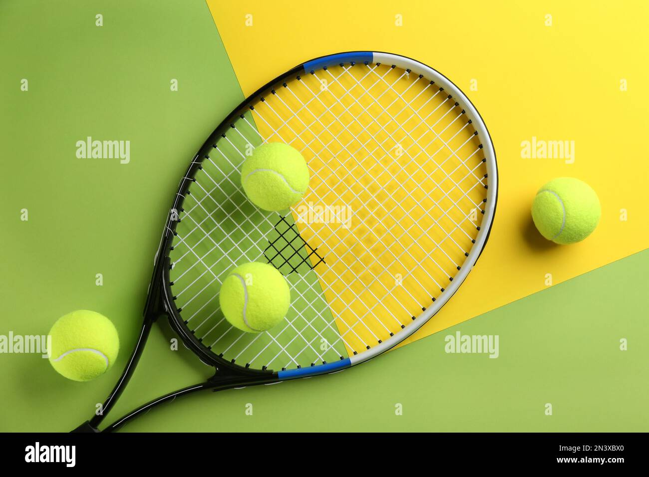 Tennis racket and balls on color background, flat lay. Sports equipment  Stock Photo - Alamy