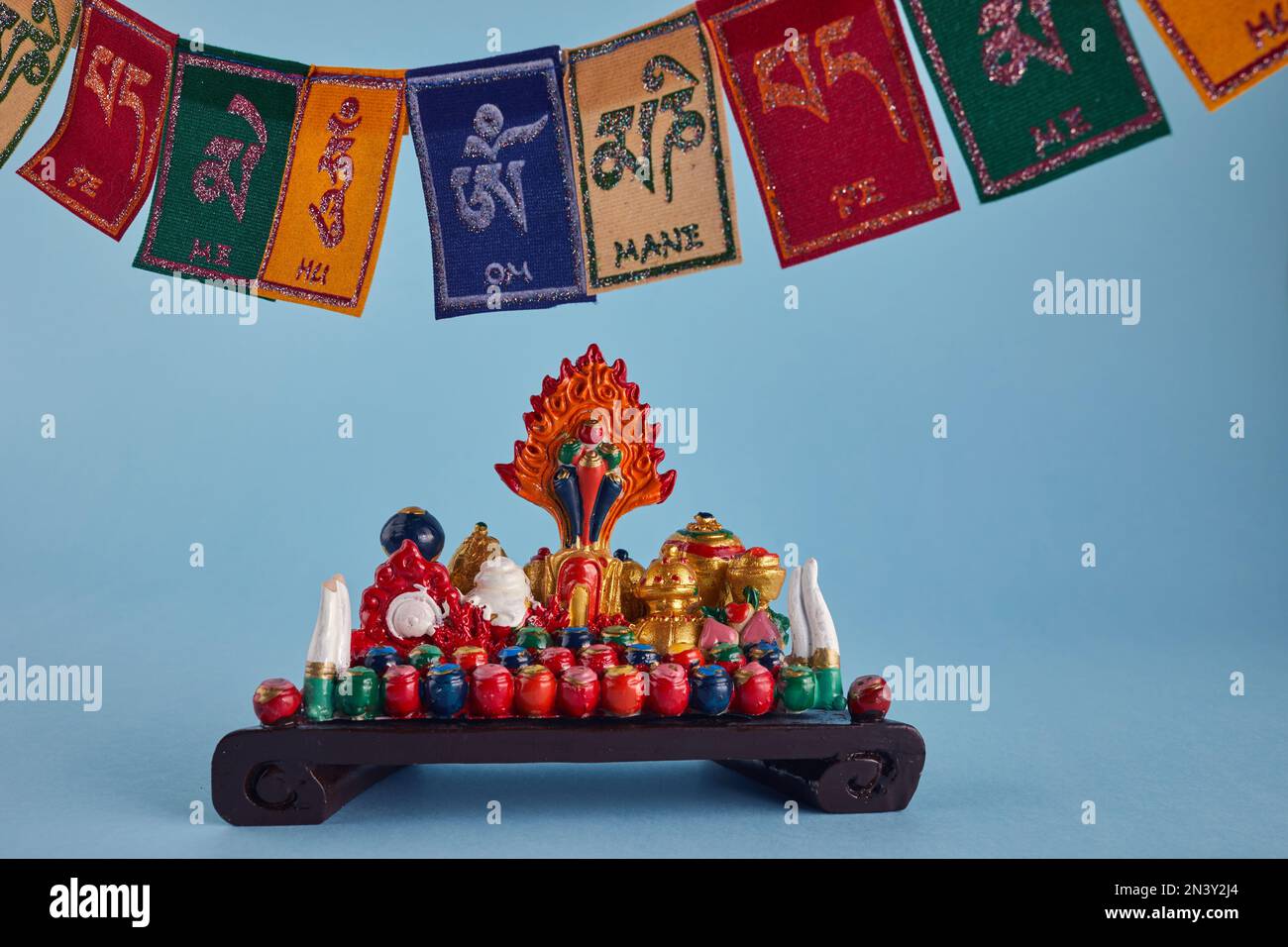 Happy Losar, Tibetan New Year background. Text on flags Om mani padme