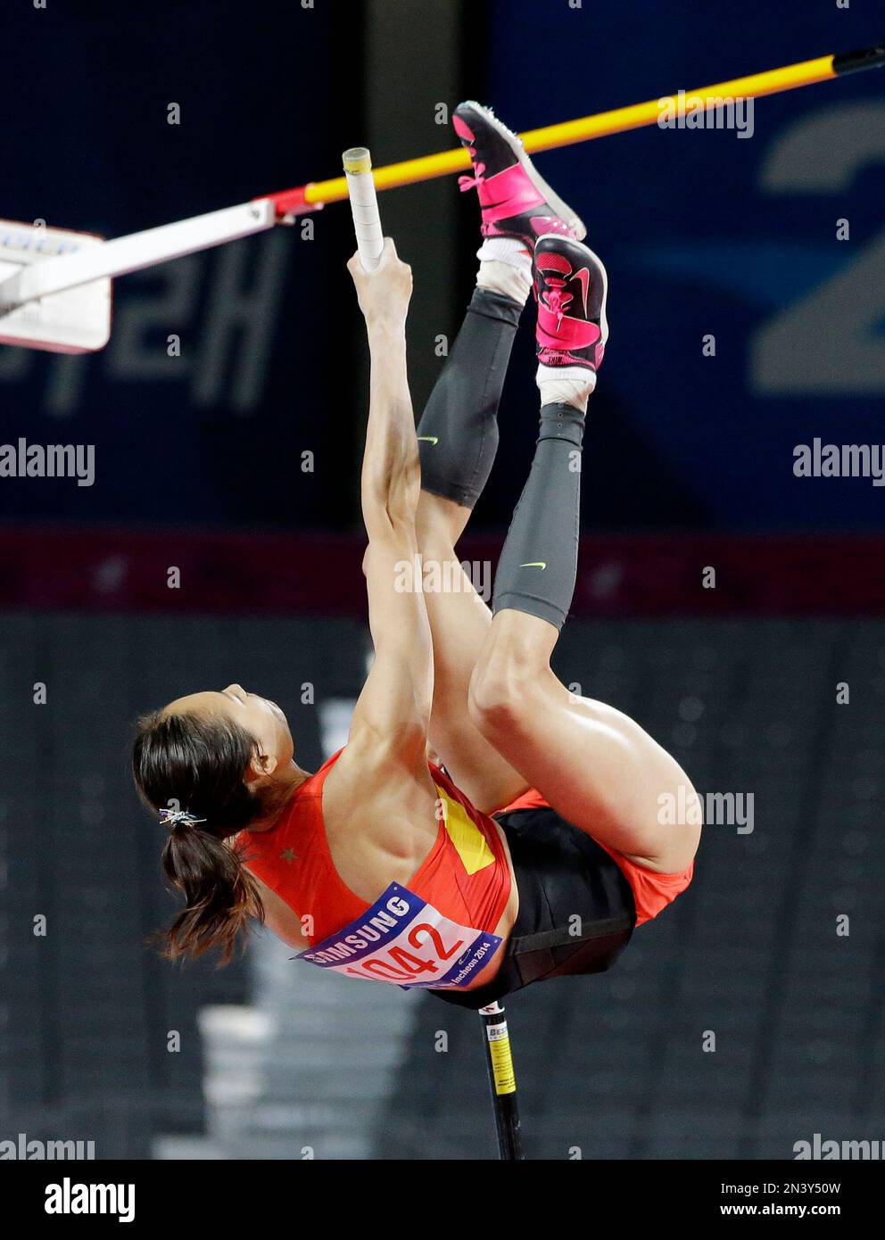 China's Li Ling competes in the women's pole vault final at the 17th ...