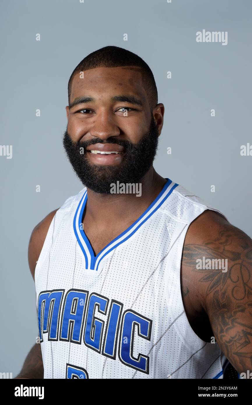 Orlando Magic forward Kyle O'Quinn poses at the team's NBA basketball