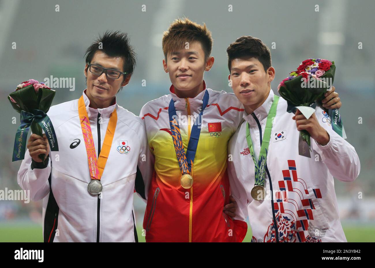 Men's pole vault gold medalist China's Xue Changrui, centre, stands ...