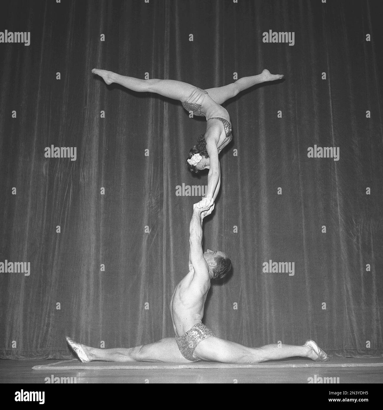 1940s acrobatic show. The three acrobats practice their balance act behind  the stage prior the performance on stage. Sweden 1946 Kristoffersson ref  T68-3 Stock Photo - Alamy