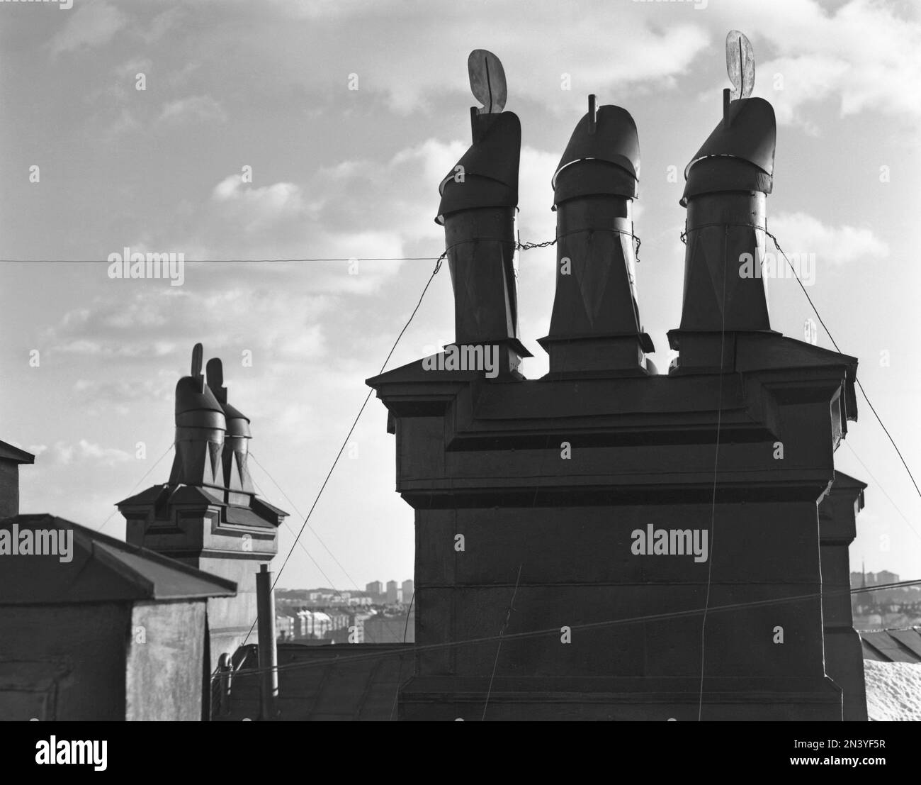 In the 1950s. Detail of chimneys on a rooftop in Stockholm Sweden. Sweden 1953 Kristoffersson ref 60K-18 Stock Photo