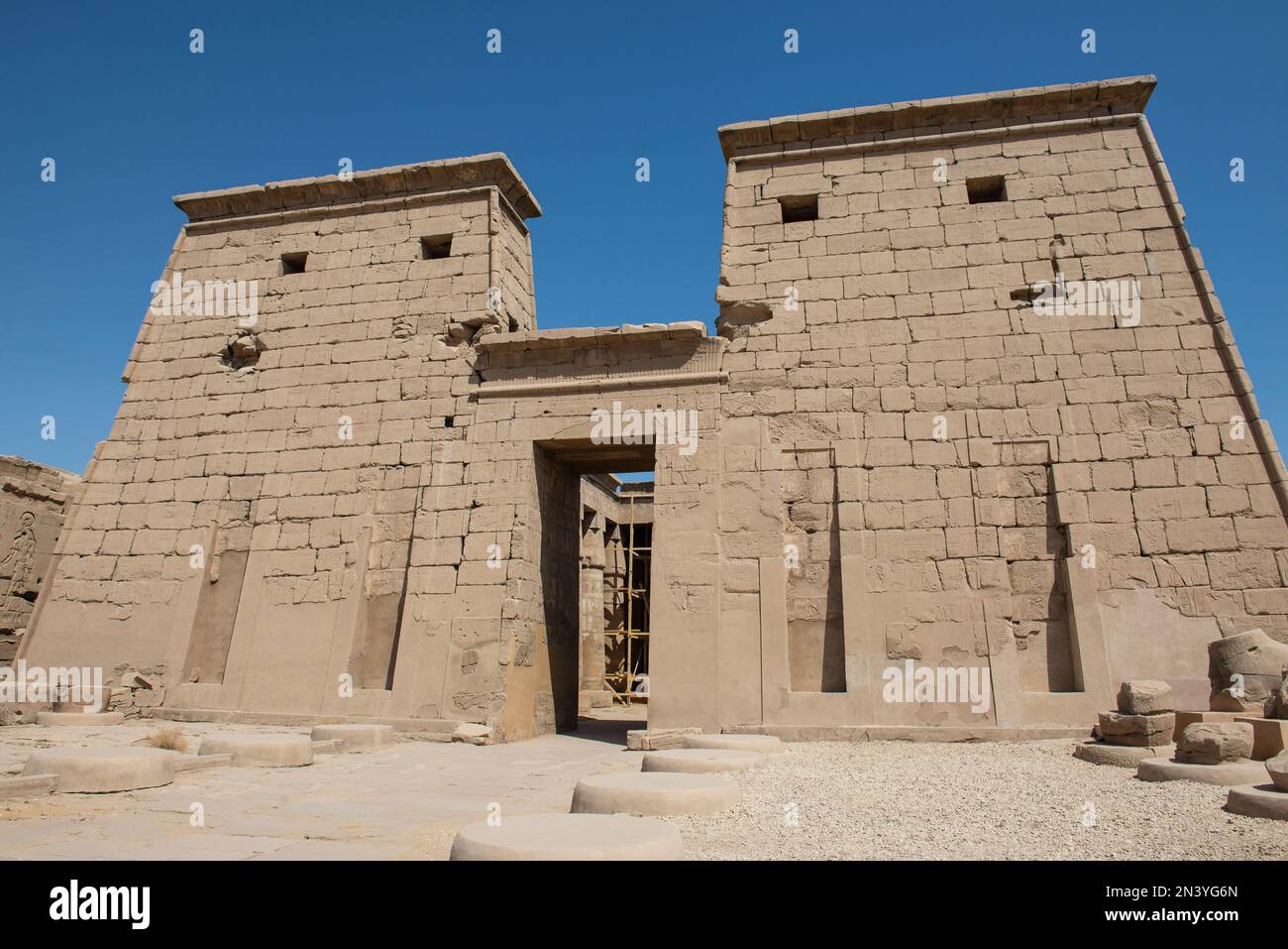 Hieroglypic carvings on entrance gate wall at the ancient egyptian