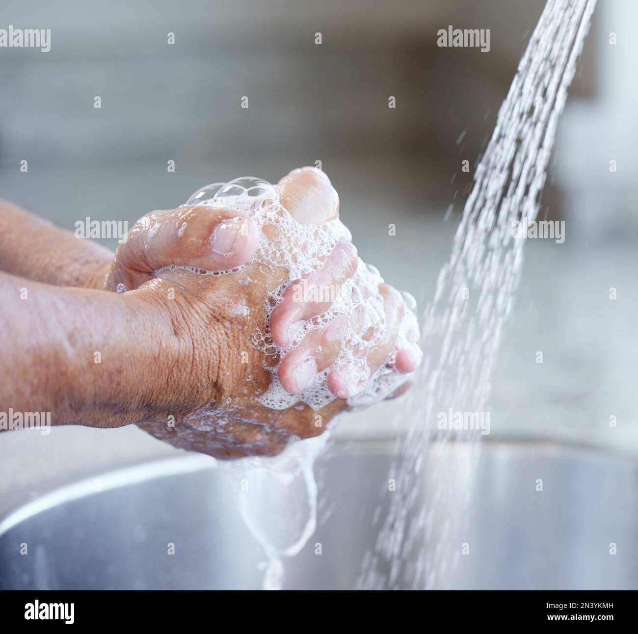 Hands, washing and soap with water at sink for health, hygiene or self ...