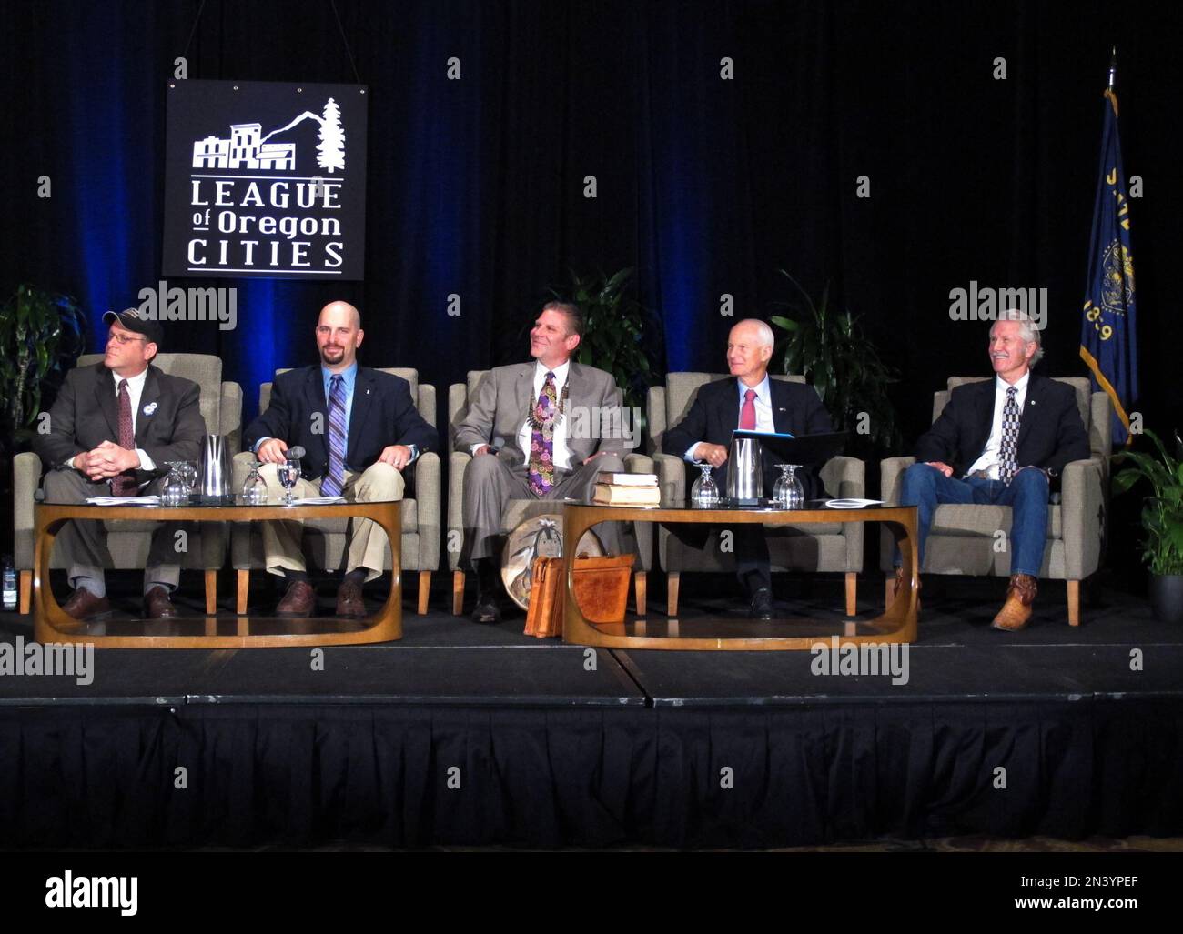Chris Henry, left, Jason Levin, Aaron Auer, Dennis Richardson and Gov. John Kitzhaber share the stage Saturday at a gubernatorial debate sponsored by the League of Oregon Cities, Sept. 27, 2014 in Eugene, Ore. (AP Photo/Jonathan J. Cooper) Stock Photo