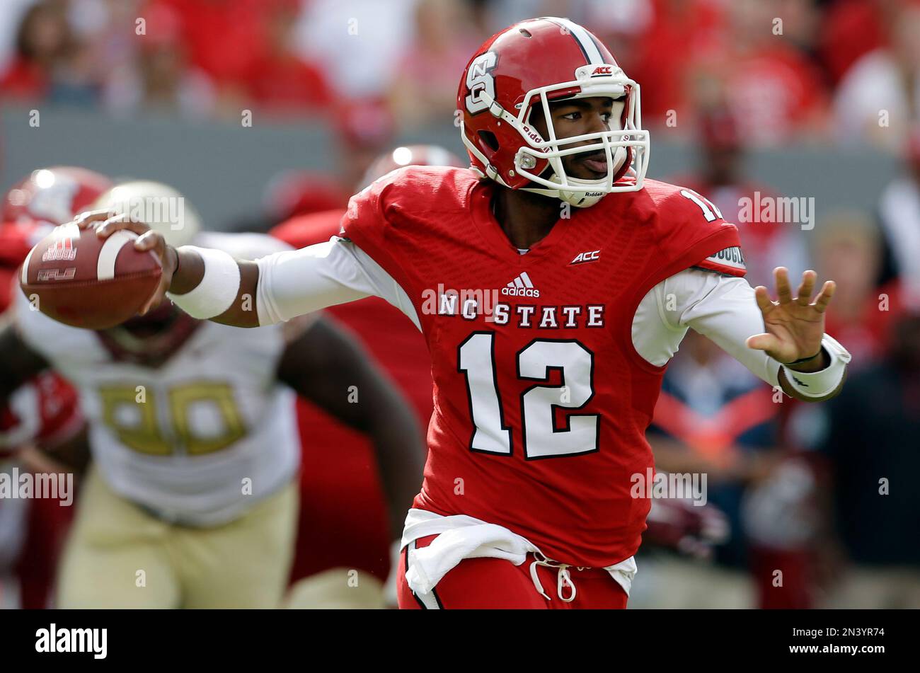North Carolina State quarterback Jacoby Brissett (12) passes during the