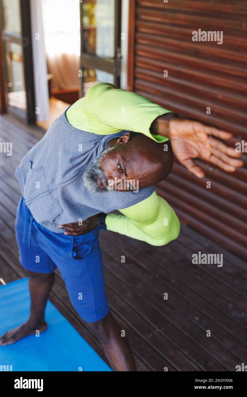 Athletic slim man stretching in hi-res stock photography and images - Alamy