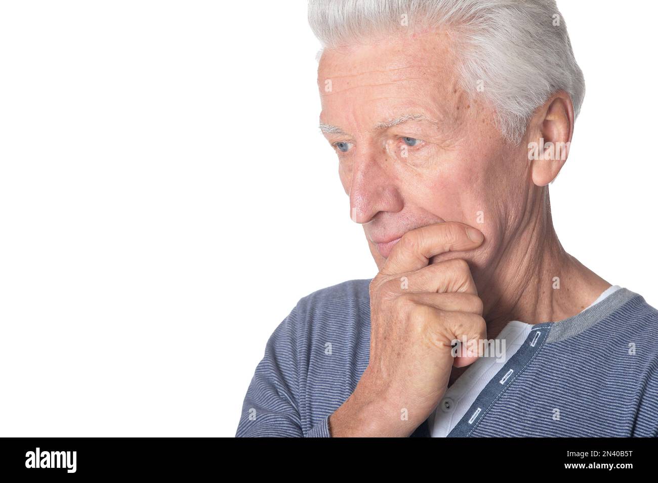 Senior Thinking thinking senior man isolated on white background Stock Photo - Alamy