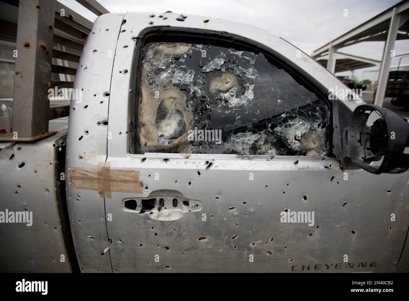 https://c8.alamy.com/comp/2N40CB2/in-this-sept-5-2014-photo-an-armored-truck-riddled-with-bullet-holes-sits-at-a-military-base-in-ciudad-mier-in-tamaulipas-state-mexico-the-military-says-they-confiscate-vehicles-that-are-abandoned-by-their-drivers-after-armed-fights-among-cartels-or-with-the-military-so-that-gangs-cannot-reuse-vehicles-parts-the-energy-reform-wont-be-viable-if-we-arent-successful-in-solving-the-problem-of-crime-and-impunity-said-mexican-senator-david-penchyna-who-heads-the-senate-energy-commission-the-biggest-challenge-we-mexicans-have-and-i-say-it-without-shame-is-tamaulipas-ap-photo-2N40CB2.jpg