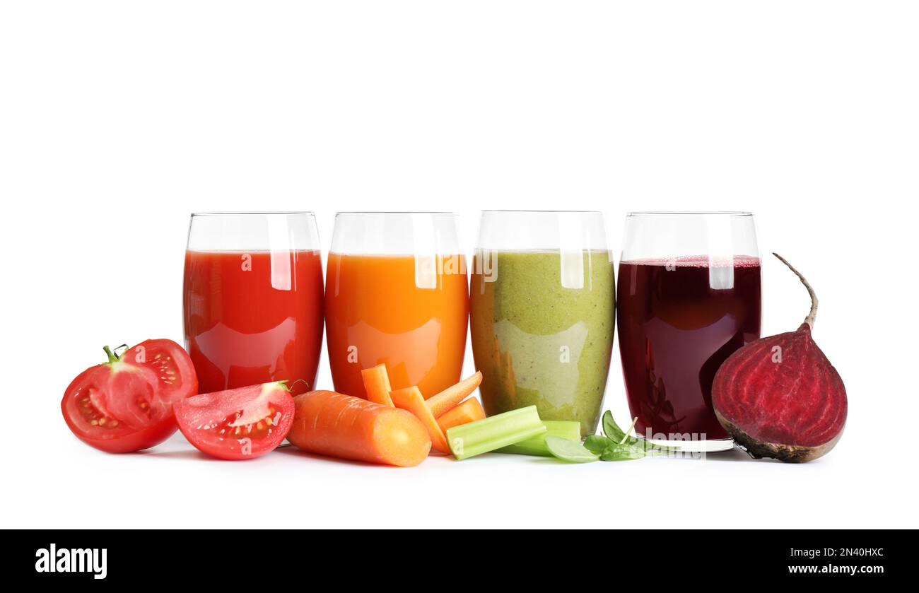 Delicious vegetable juices and fresh ingredients on white background