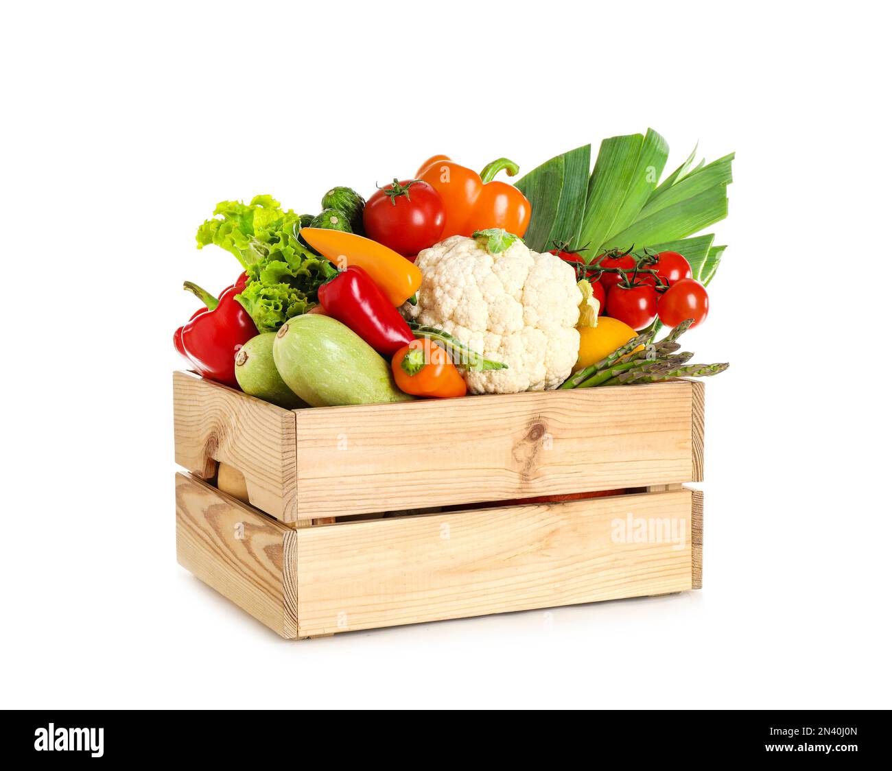 Wooden crate with fresh vegetables on white background Stock Photo - Alamy