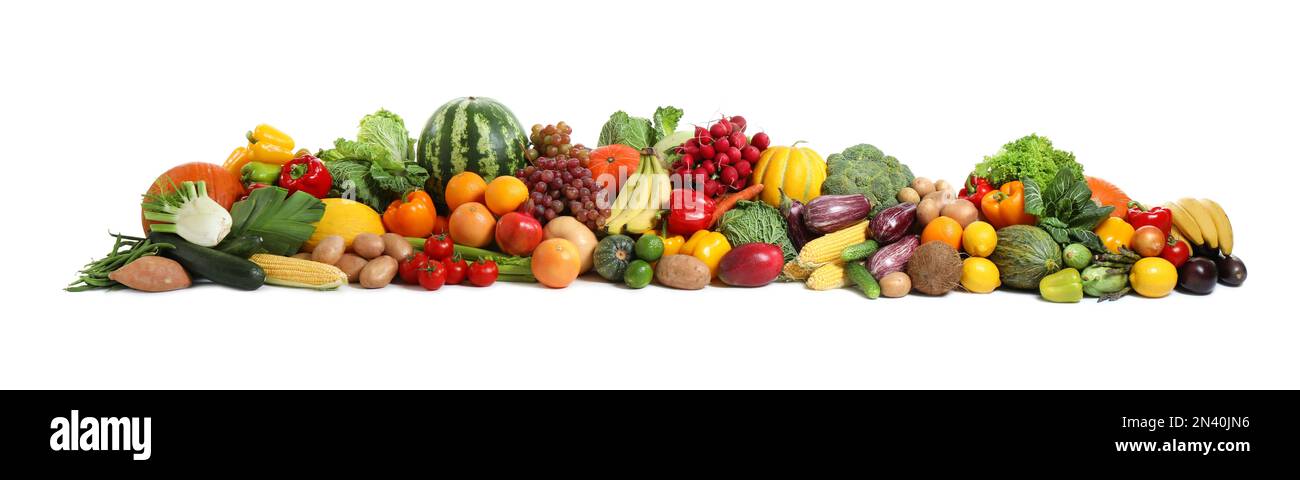 Assortment of fresh organic fruits and vegetables on white background