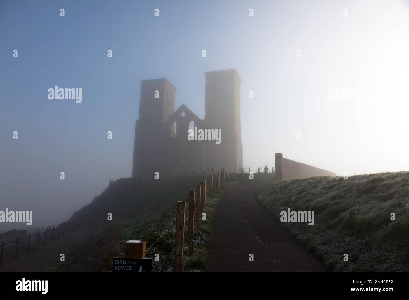 The Remains of St Mary's Church in  early  morning freezing fog, at Reculver Country Park, Thanet, Kent Stock Photo