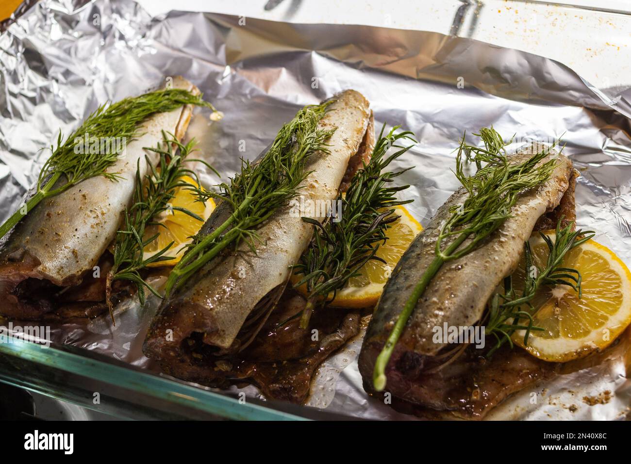 mackerel fish with rosemary and lemon dish, several objects, served lying on the sheet for
