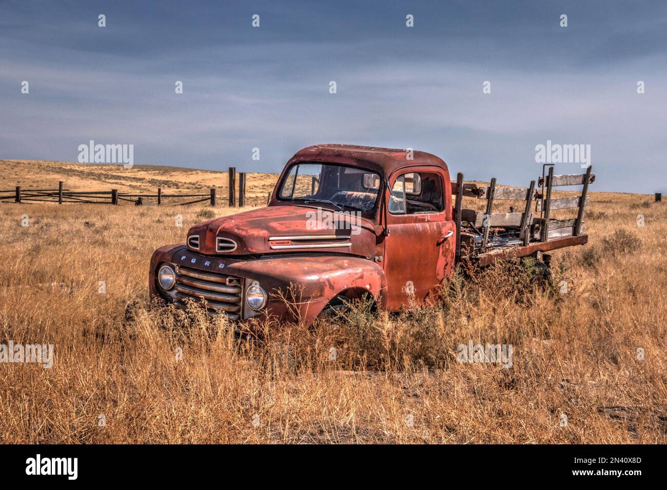 Abandoned old Ford Truck in the field Stock Photo