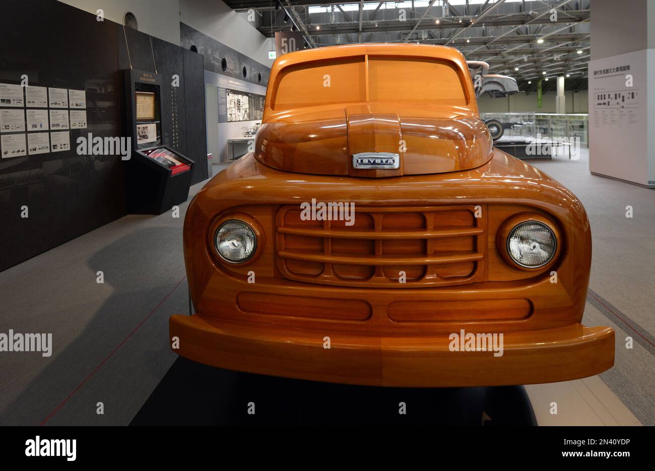 A wooden prototype of a Toyota pickup truck displayed at the Car
