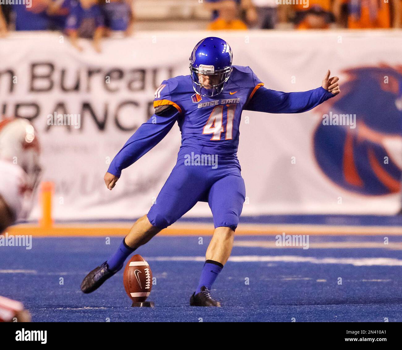 Boise State kicker Dan Goodale (41) kicks the ball during the second half  of an NCAA college football game against Louisiana-Lafayette in Boise,  Idaho, on Saturday, Sept. 20, 2014. Boise State won