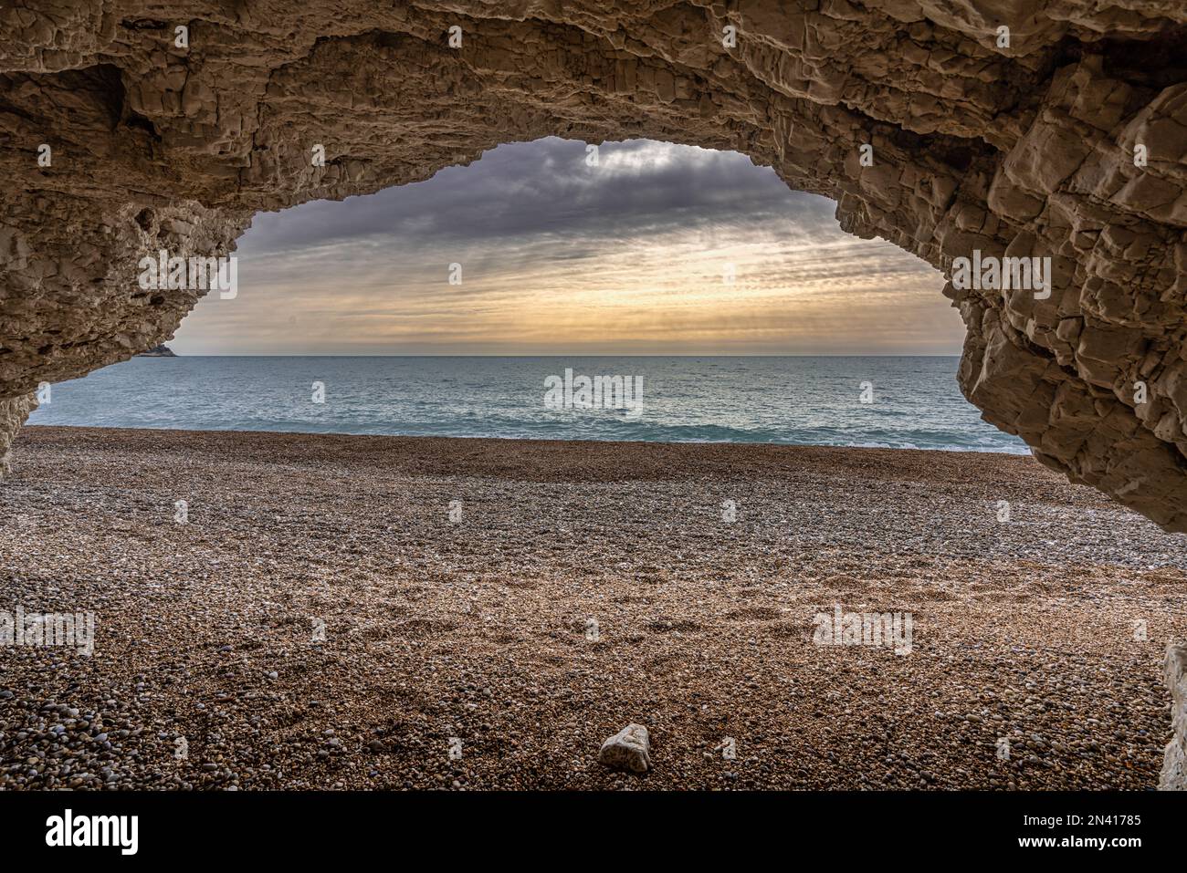 The sea of Vignanotica beach seen from a cave in the white limestone cliff. Mattinata, Foggia Province, Gargano, Puglia, Italy, Europe Stock Photo