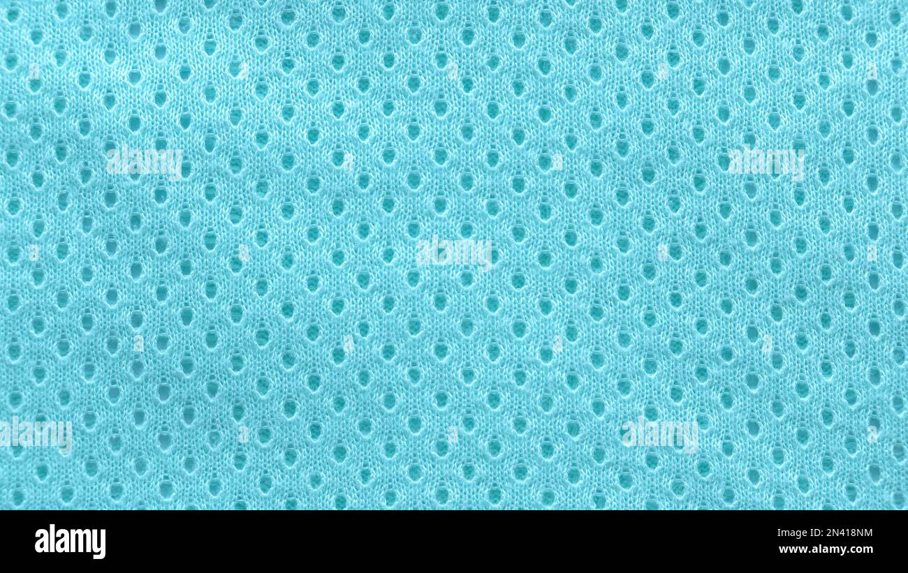 A blue fabric texture of an eyelet baby cloth. Stock Photo