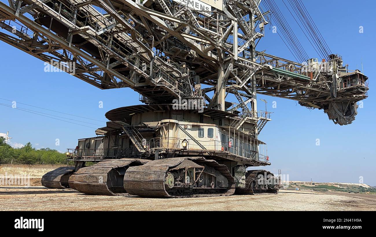 Huge bucket wheel at a coal surface mine. Huge excavator on open pit
