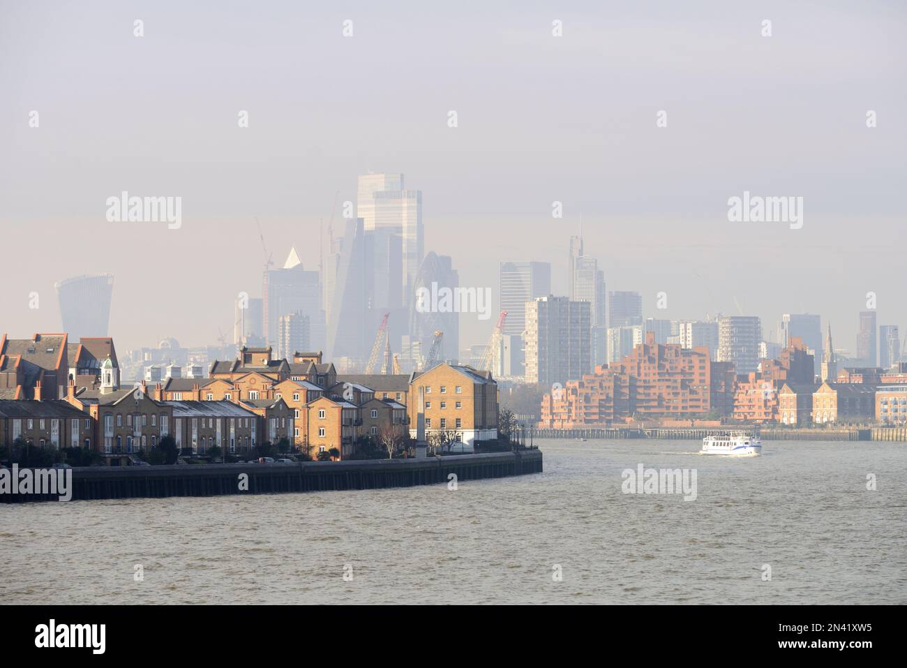 Misty City Square Mile financial district and the Thames from East London, United Kingdom Stock Photo