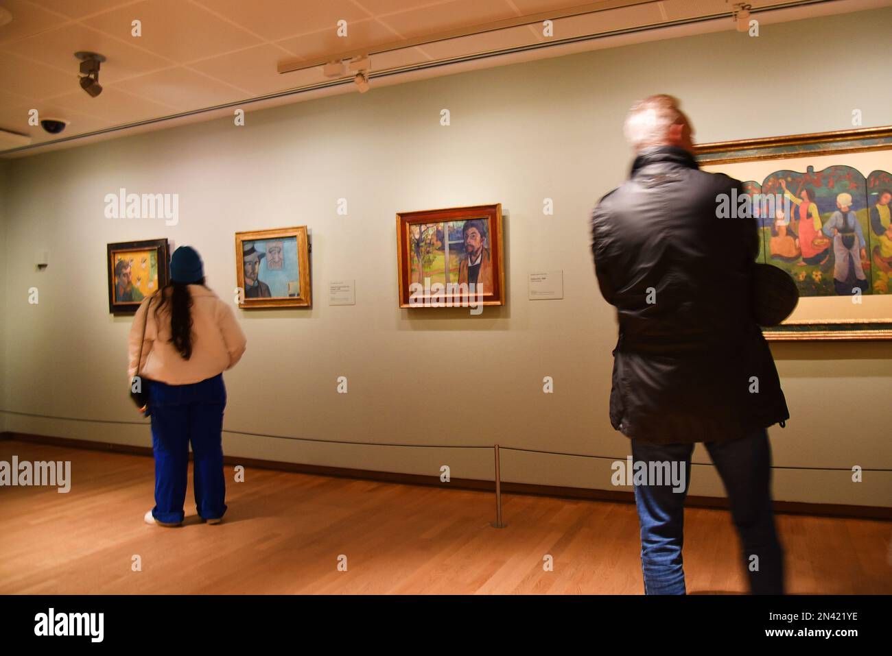 Amsterdam, Netherlands. January 2023. Visitors admire paintings by Vincent van Gogh in Amsterdam. High quality photo Stock Photo