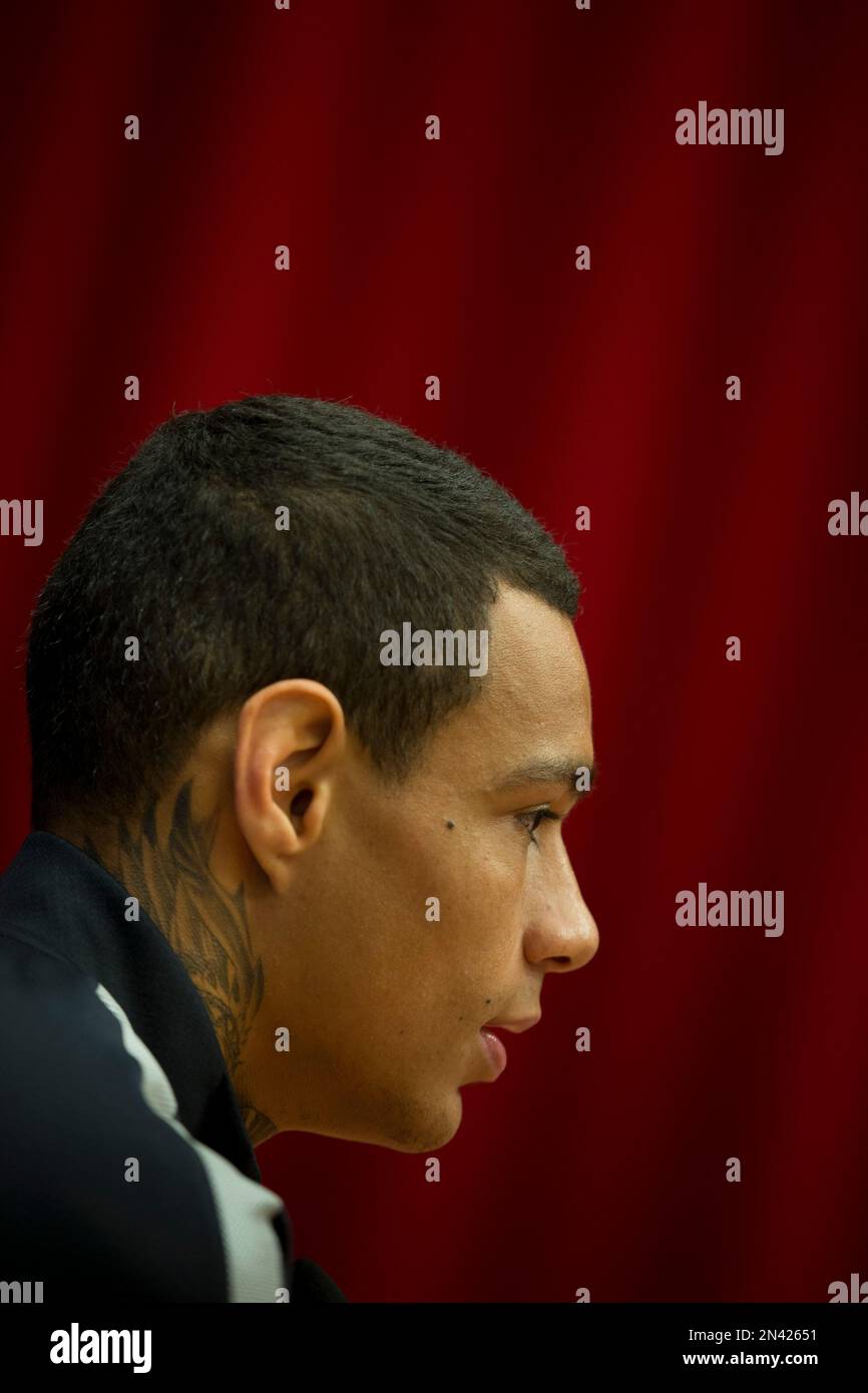 PSG's Gregory van der Wiel sports a tattoo in his neck as he