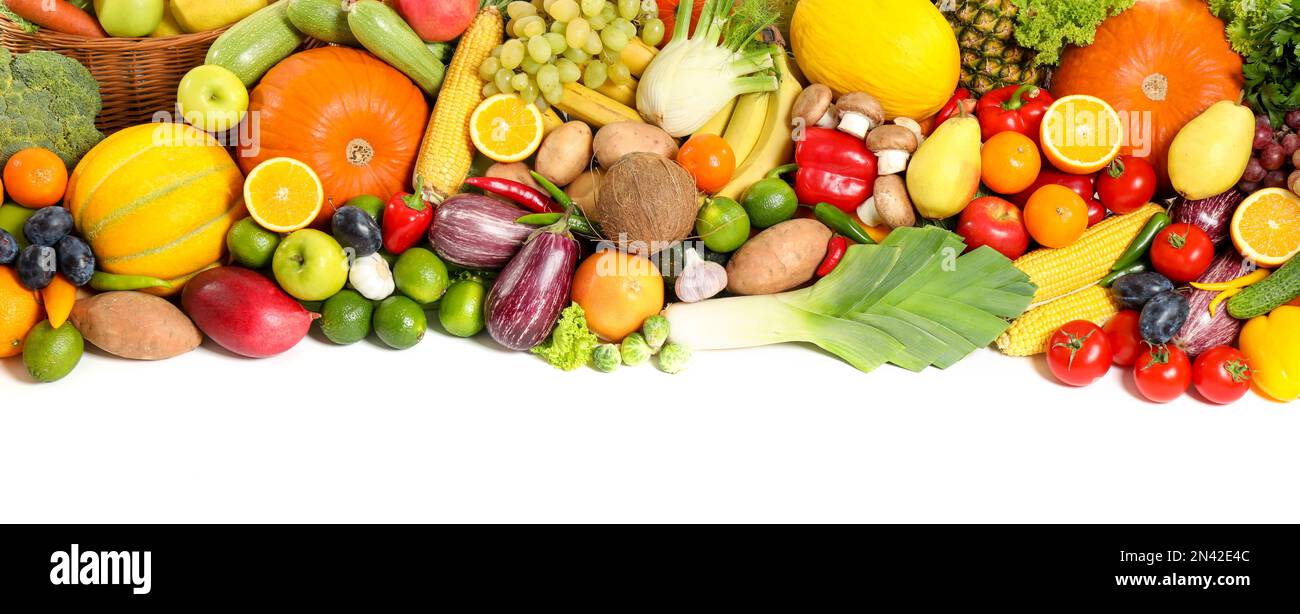 Assortment of fresh organic fruits and vegetables on white background ...