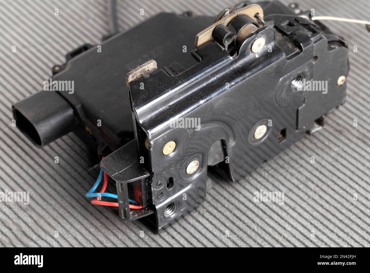 Car electric door lock, closeup. Limit switch failure, automotive part. Car electrical repair