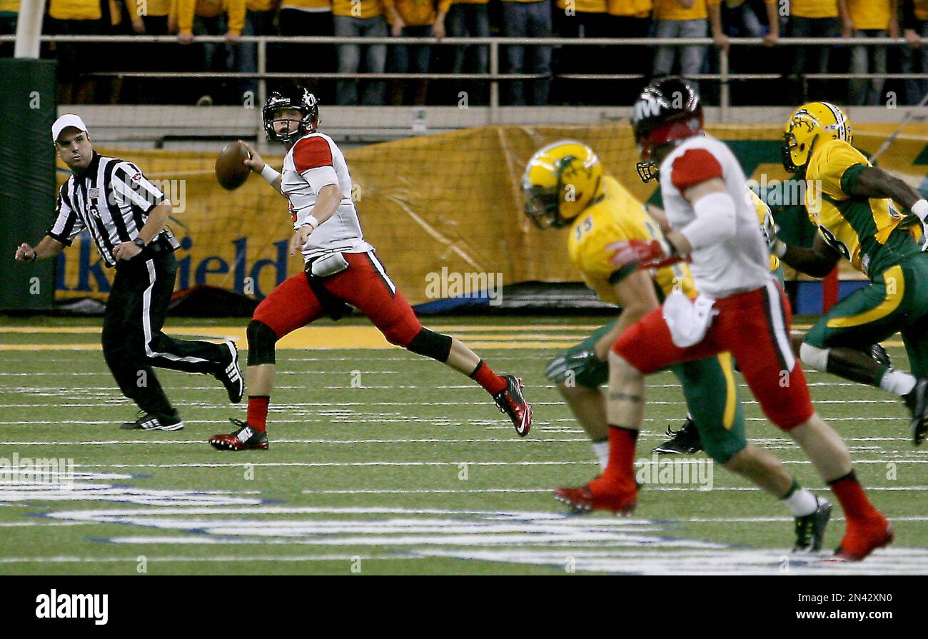 Incarnate Word quarterback Taylor Woods is pursued by North Dakota