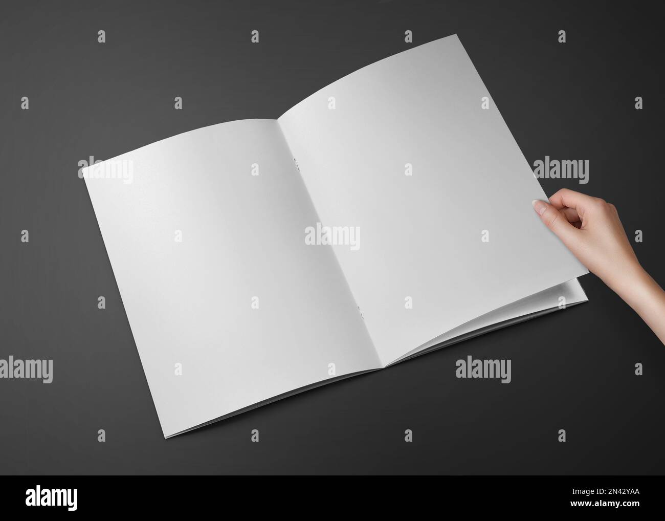 A4 Advertising Magazine Brochure Mockup 3D Rendering with Hand Stock ...