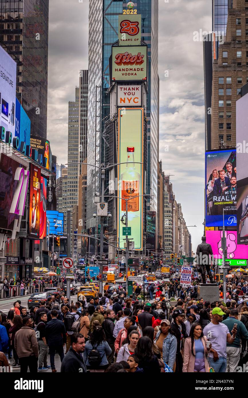 New York, USA - April 24, 2022: Times Square with tourists. Iconified 