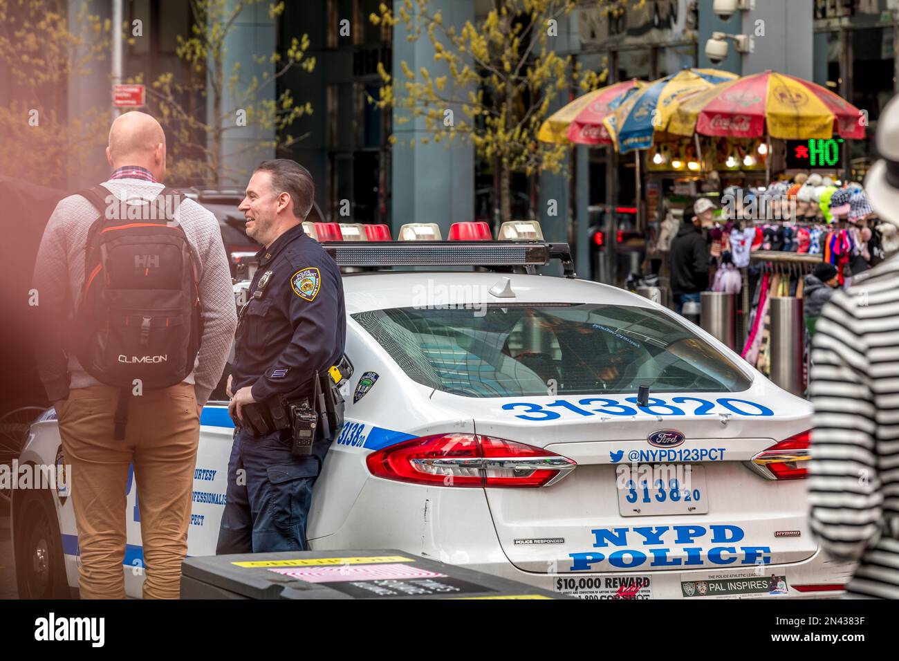 New York, USA - April 24, 2022: Policeman with his car in Times Square in New York Stock Photo