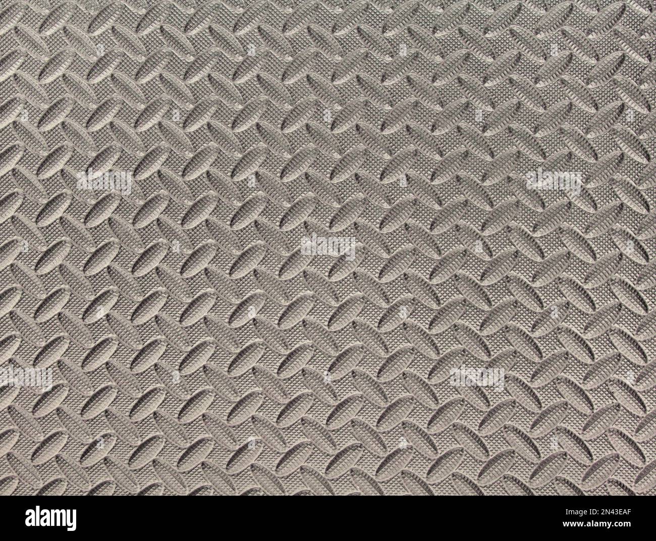 Black shiny background with convex ovals arranged in rows. Stock Photo