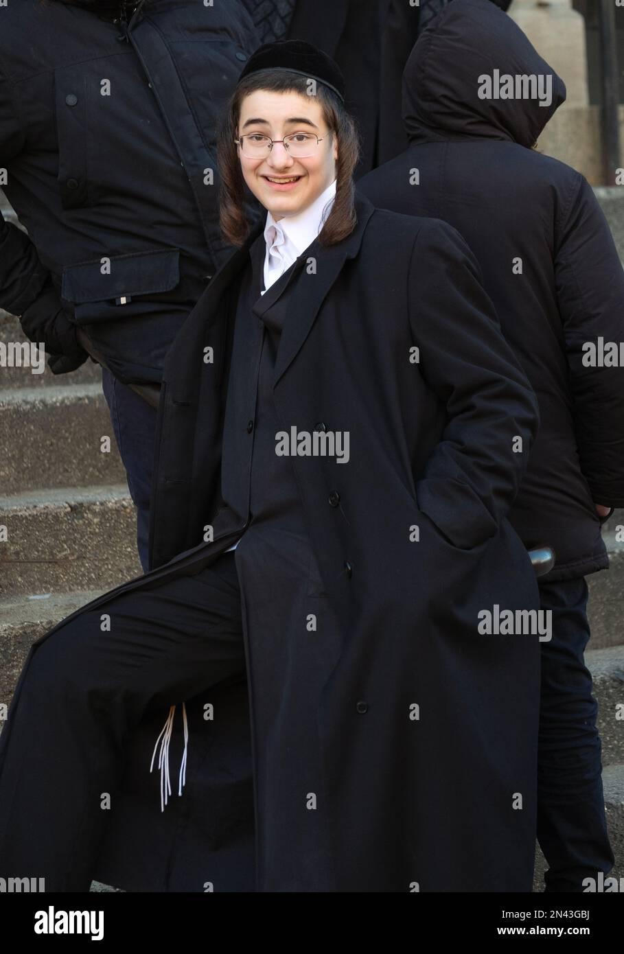 Posed Portrait Of An Orthodox Jewish Teenager On The Steps Of His ...