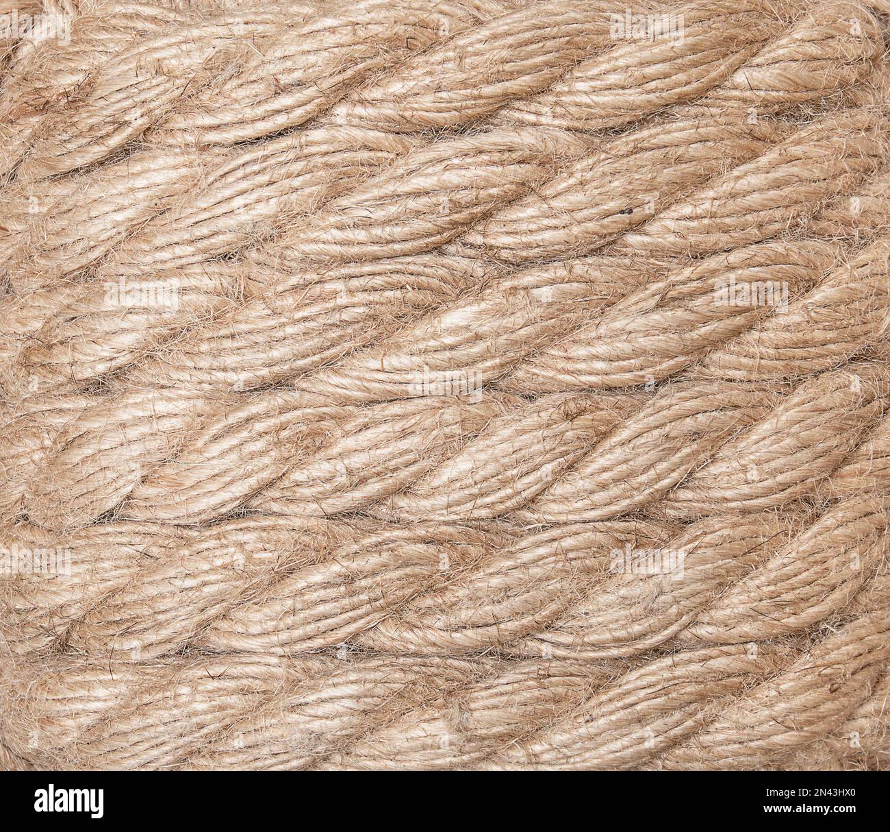 Texture of beige thick jute ropes with pile. Stock Photo