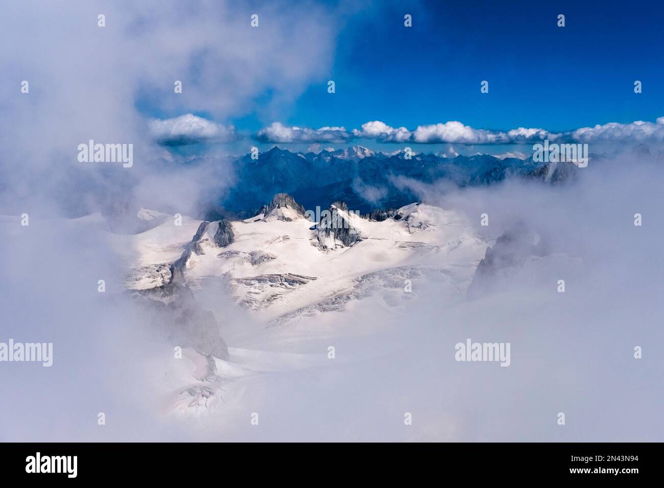 View from Aiguille du Midi of the Géant Glacier, clouds moving in Stock ...