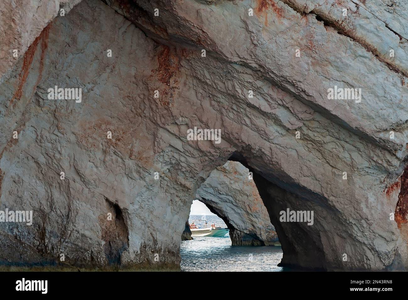 Blue Caves rock formation with pass, Ionian Sea, Zakynthos, Greece Stock Photo