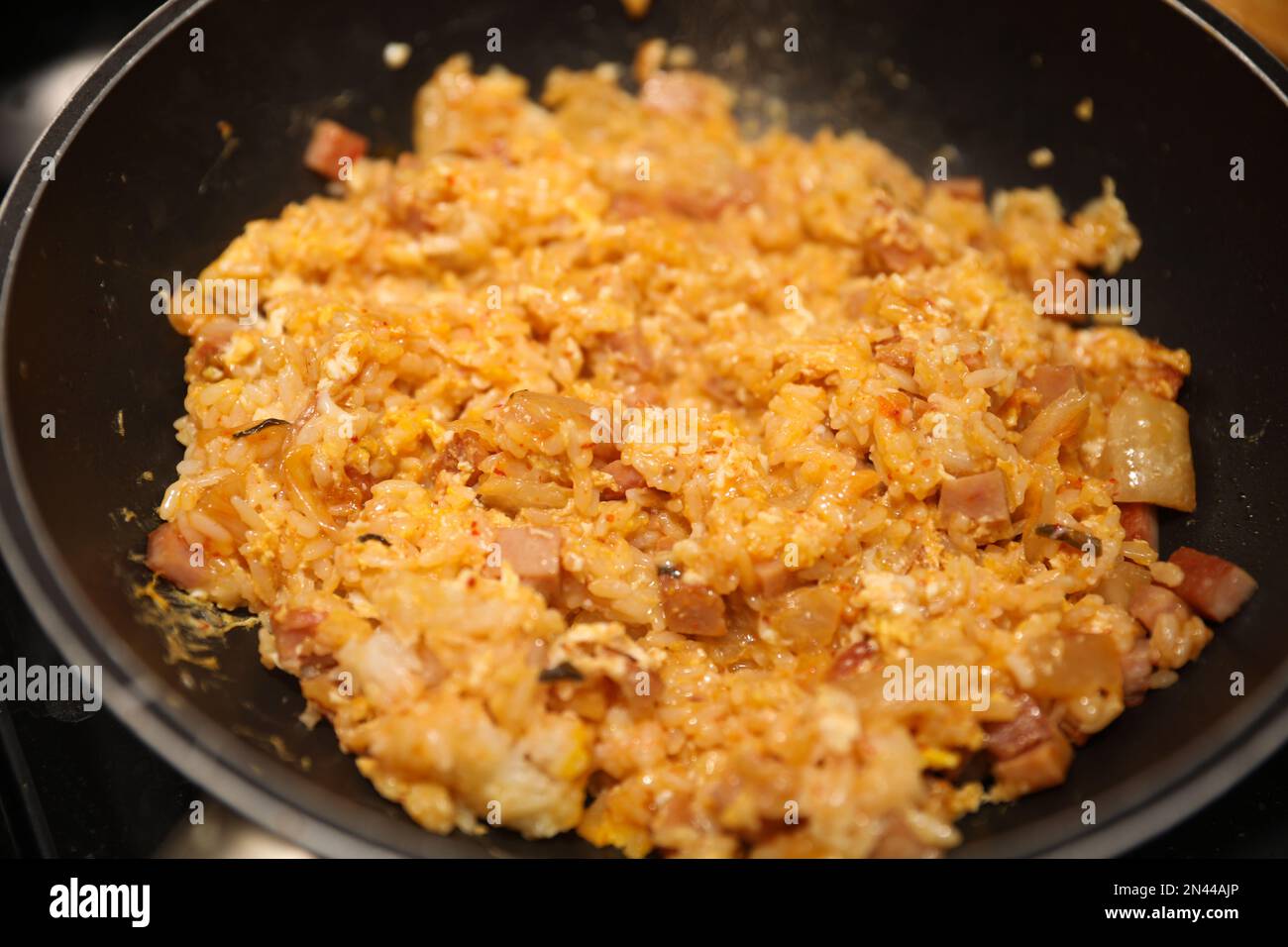 Fried Rice Cooking in pan and bowl Stock Photo Alamy