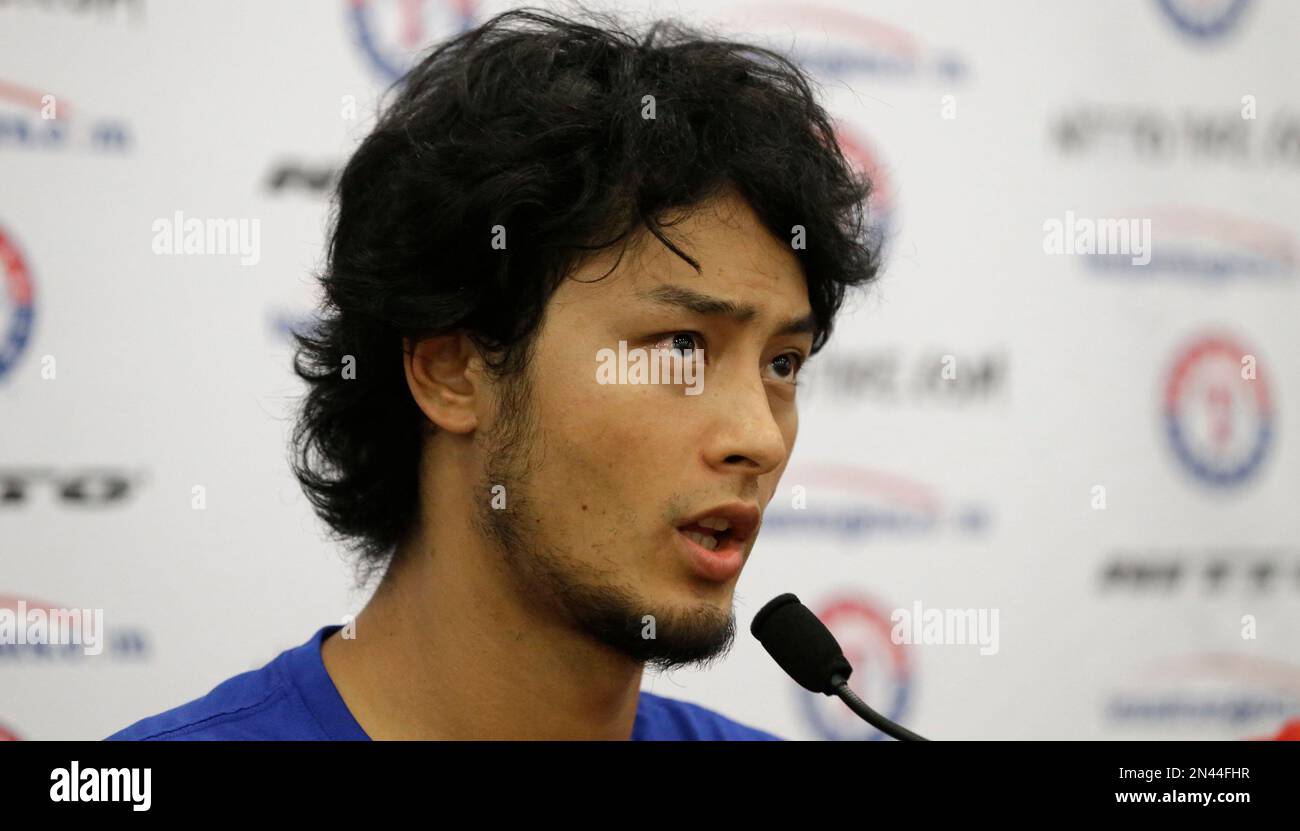 NISHINOMIYA, Japan - Farsad Darvish (L) and his wife Ikuyo (C), parents of  Tohoku High Schools ace Yu Darvish,who would later become pro club Nippon  Ham Fighters pitcher, root for their son