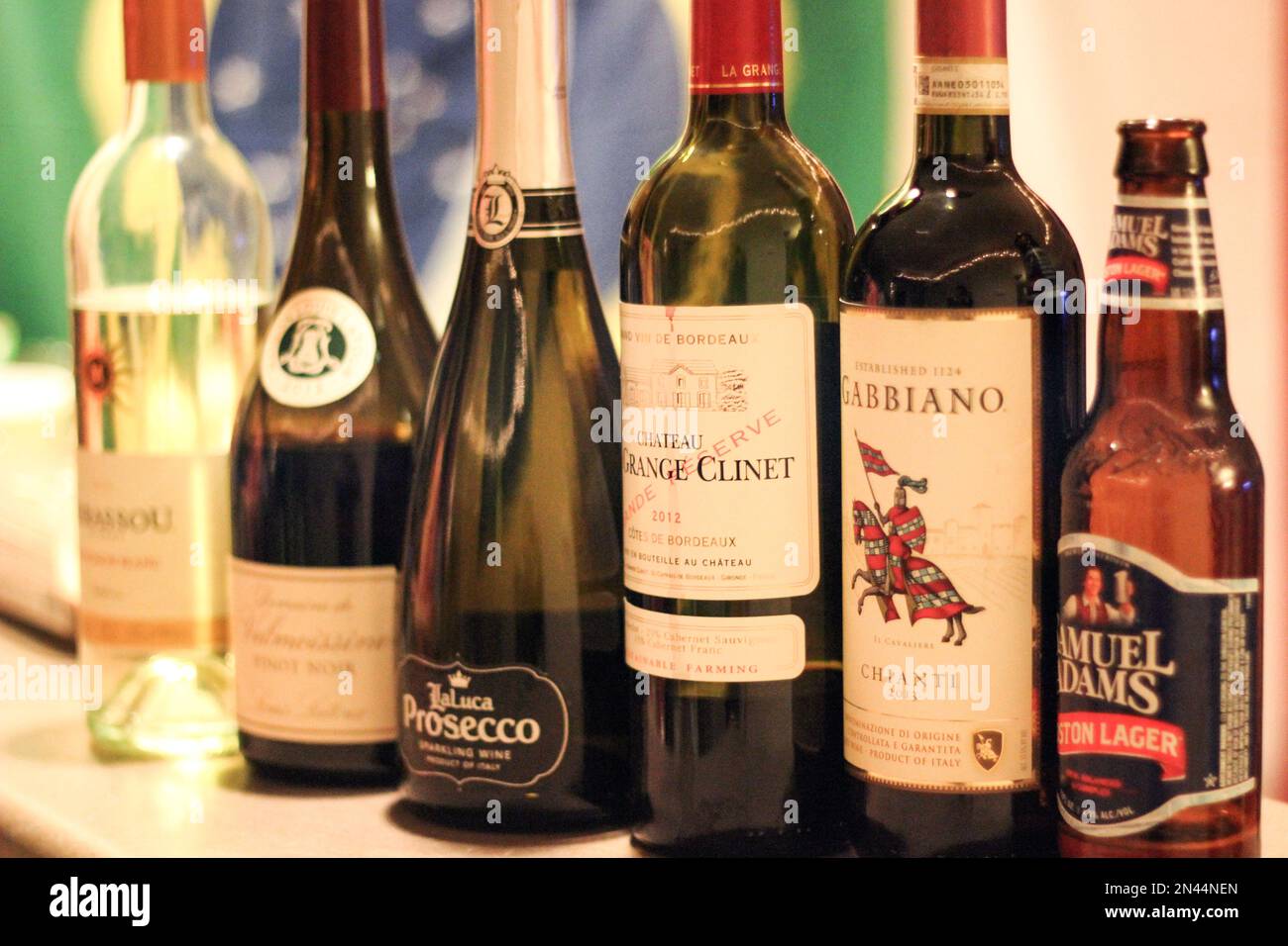 Making alcohol drink with shot glass in cup Stock Photo Alamy