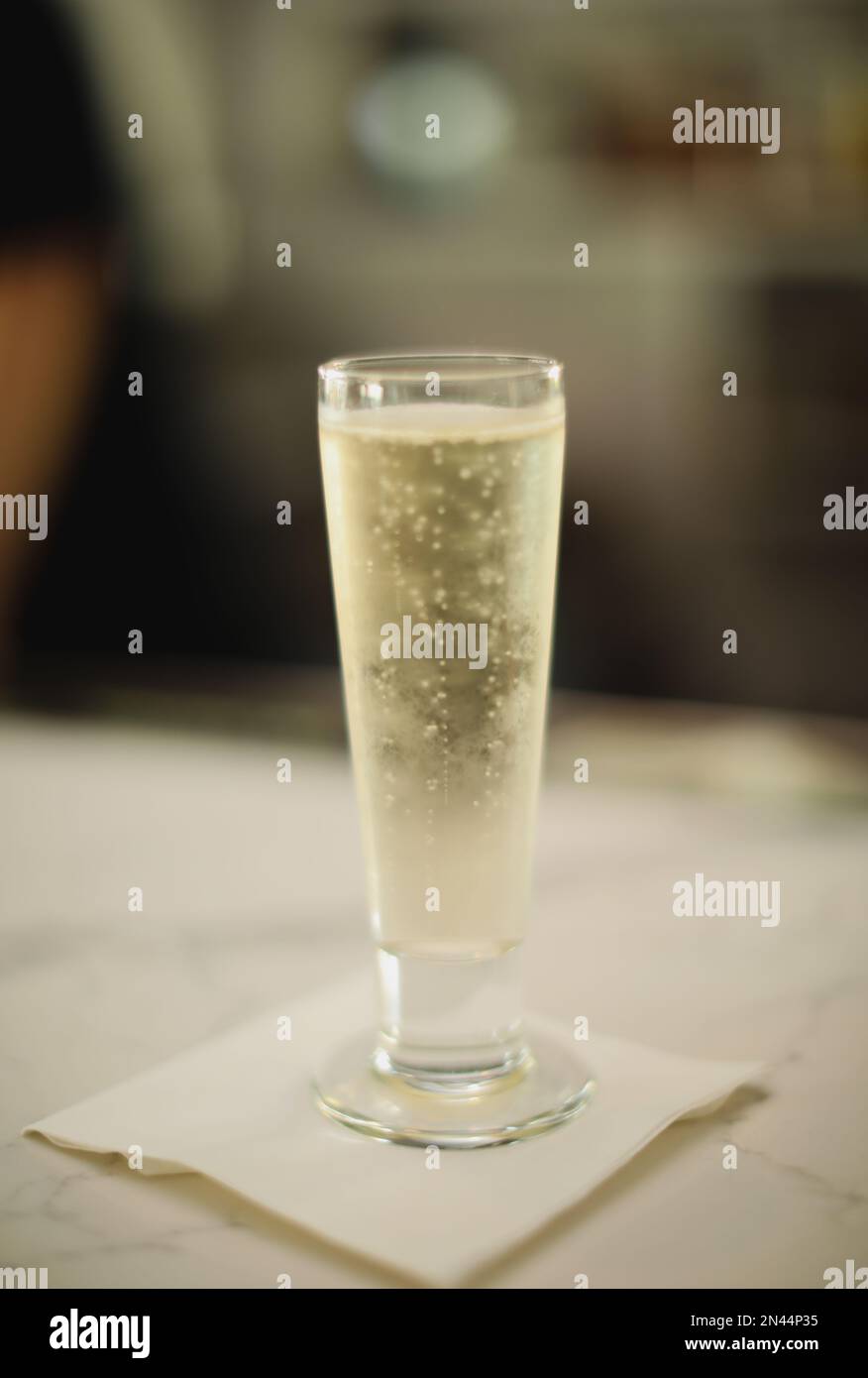 Making alcohol drink with shot glass in cup Stock Photo Alamy