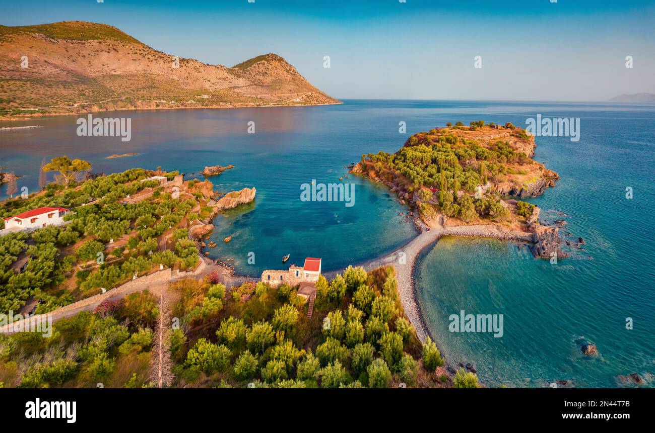 Picturesque view from flying drone of Purpose or Double beach, Kotronas town location. Fantastic evening seascape of Mediterranean sea, Peloponnese pe Stock Photo